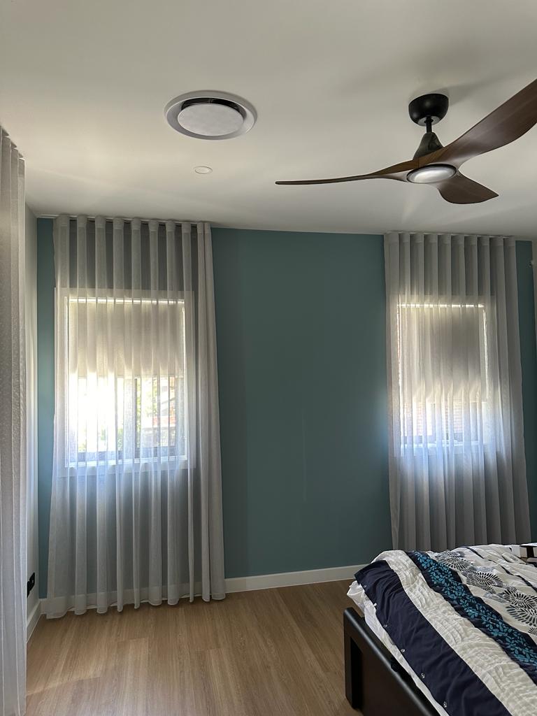 Sheer curtain and roller blind